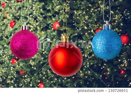 Christmas bauble hanging decoration with bokeh light background celebration holiday banner template Christmas bauble hanging decoration with bokeh light background celebration holiday banner template 130726651