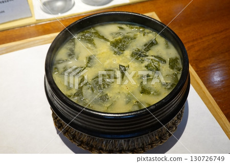 Miyeok Guk is a flavorful Korean seaweed soup, typically made with seaweed, beef, and soy sauce. A comforting dish often enjoyed on birthdays or as a healing food after childbirth. Miyeok Guk is a flavorful Korean seaweed soup, typically made with seaweed, beef, and soy sauce. A comforting dish often enjoyed on birthdays or as a healing food after childbirth. 130726749