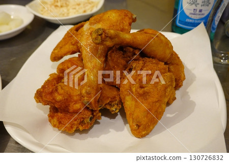 Crispy Korean fried chicken glazed with sweet and spicy sauce, paired with gooey, golden cheese balls. A perfect duo of bold flavor and melty indulgence in every bite. 130726832