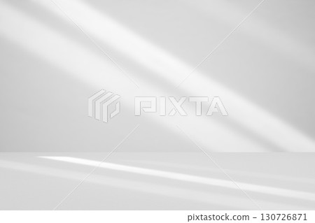 Abstract white studio room with light and shadow from window background for product display presentation Abstract white studio room with light and shadow from window background for product display presentation 130726871