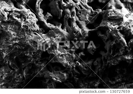Up close, the stone looks like a cluster of minerals Up close, the stone looks like a cluster of minerals 130727659