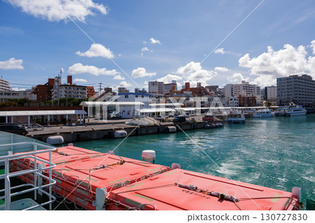 A view of Naha Tomari Port from a departing ship. Tomari Bridge and Tomarin are visible. Naha Tomari Port, Naha City, Okinawa Prefecture - June 26, 2025 130727830