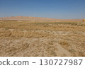 Dry desert landscape with arid plains and mountains in Balkh Province of northern Afghanistan 130727987