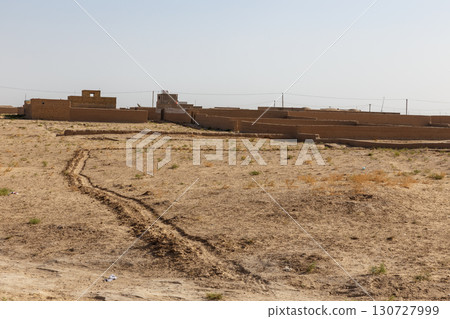 A traditional mud brick village in the desert of Jowzjan Province in northern Afghanistan 130727999