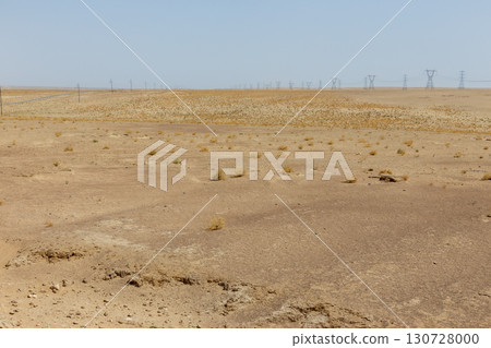 Vast desert landscape with power lines in the remote Jowzjan Province of northern Afghanistan 130728000