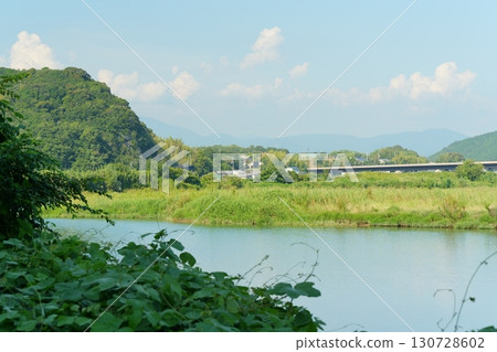 Clear stream and rural scenery 130728602
