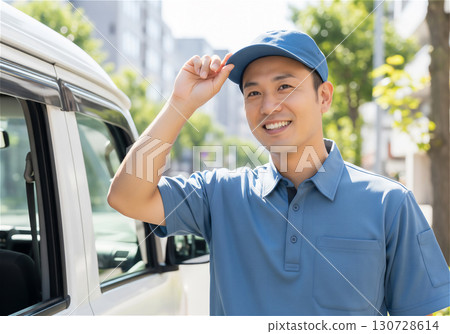 Delivery staff delivering packages with a smile: A delivery service that gives customers peace of mind 130728614