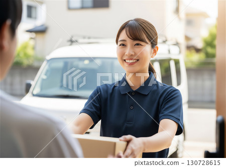Delivery staff delivering packages with a smile: A delivery service that gives customers peace of mind 130728615