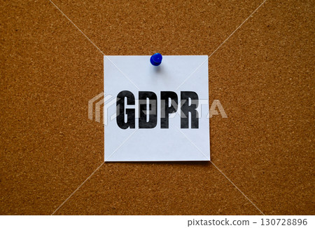 General Data Protection Regulation abbreviation on white note pinned on cork board 130728896