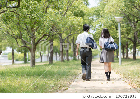 High school student walking in the park 130728935