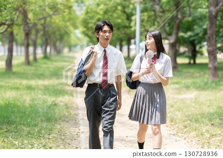 High school student walking in the park 130728936