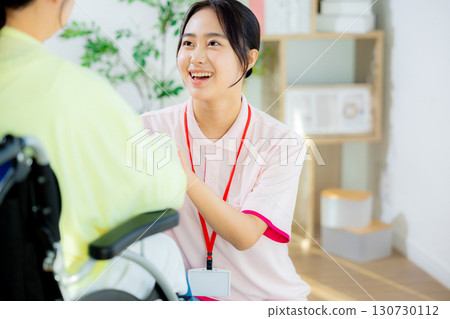 Young woman, caregiver, wheelchair, trainer 130730112