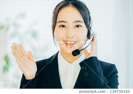 Female operator with white background 130730193