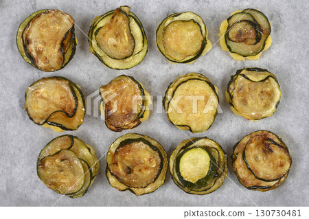 Polenta bites  with fried zucchini 130730481