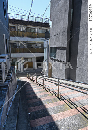 A monument to the former residence of Kenji Miyazawa stands on the stairs in Hongo, Bunkyo Ward, Tokyo. A monument to the former residence of Kenji Miyazawa stands on the stairs in Hongo, Bunkyo Ward, Tokyo. 130730639