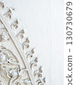 Thai temple stucco art on the white wall. 130730679