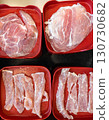 Fresh Sliced Pork Collar and Marinated Meat in Red Tray for Shabu Hotpot. 130730682