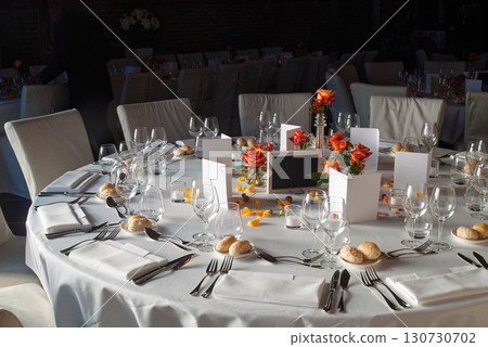 Luxurious Table Setting for Elegant Formal Dining Event or Celebration Luxurious Table Setting for Elegant Formal Dining Event or Celebration 130730702