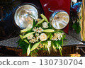 Vintage Car Decorated with Elegant Floral Arrangement of White Roses and Lilies 130730704