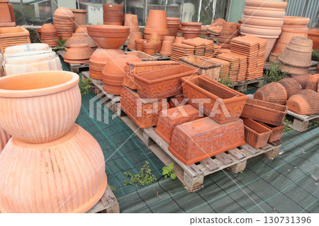 Terracotta pots in shop of Europe, Italy. Gardening and hobby. Nature and plants. Terracotta pots in shop of Europe, Italy. Gardening and hobby. Nature and plants. 130731396