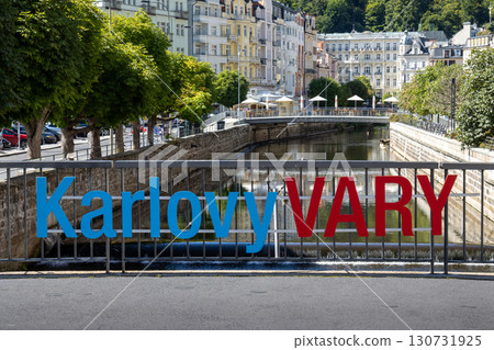 Sign Karlovy Vary on a Ohre bridge, Karlovy Vary, Czechia 130731925