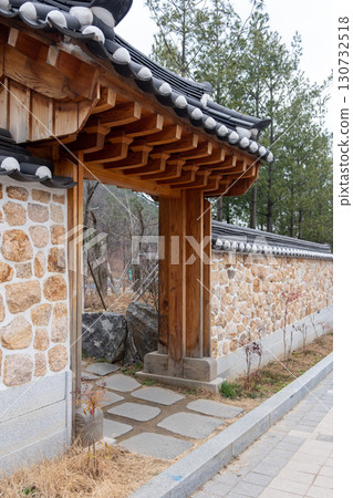 Korean traditional stone wall boundary and gate at Eunpyeong Hanok Village, Seoul, South Korea Korean traditional stone wall boundary and gate at Eunpyeong Hanok Village, Seoul, South Korea 130732518