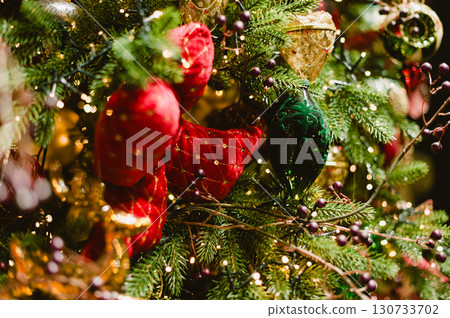 A Christmas tree with red and green ornaments A Christmas tree with red and green ornaments 130733702