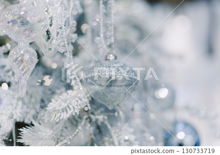 A tree with a silver ball on it A tree with a silver ball on it 130733719