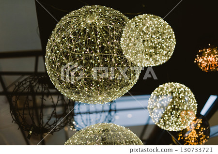 A cluster of lights in the shape of balls. Christmas 130733721