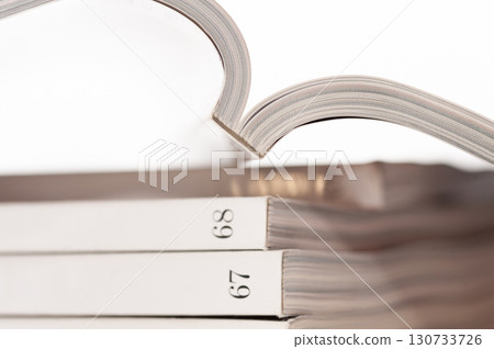 A book is open to page number 67, 68 A book is open to page number 67, 68 130733726