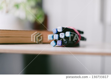A bunch of pens are on a table A bunch of pens are on a table 130733817