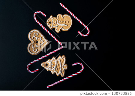 Three gingerbread cookies with hearts. Christmas 130733885