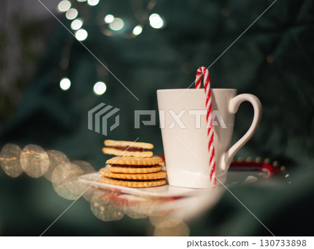 A white mug with a red A white mug with a red 130733898