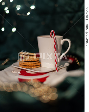 A white mug with a red A white mug with a red 130733899