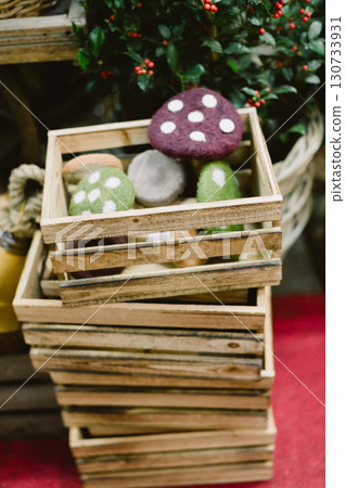 A stack of wooden crates with a green mushroom on top 130733931