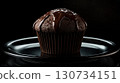 Chocolate cupcake with chocolate frosting on top 130734151