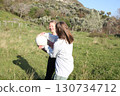 teenage girl playing ball outside, lifestyle people concept 130734712