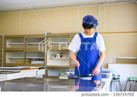 Male students studying at cooking classes Lifestyle of young people learning to cook Male students studying at cooking classes Lifestyle of young people learning to cook 130734789