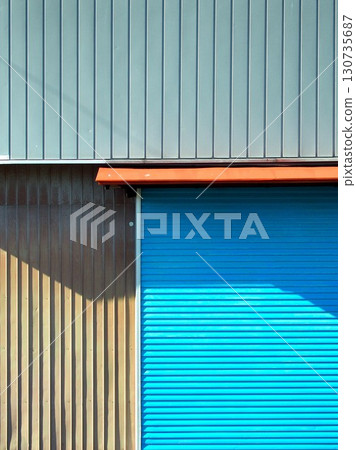 A landscape with a garage shutter and wall 130735687