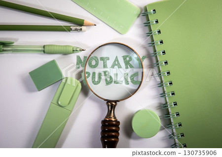 Notary public legal concept with magnifier and green office items 130735906