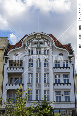 Ornate historic 1908 bank building, showcasing intricate Art Nouveau architecture, financial institution heritage, and enduring business tradition 130737208