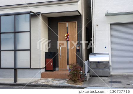 Beautiful Shimenawa hanging at the entrance 130737716