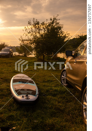 Lakeside Adventure with SUV and Paddleboard 130737897