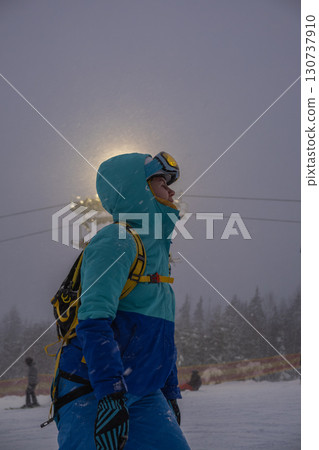 Person in Winter Gear Near Ski Lift Person in Winter Gear Near Ski Lift 130737910