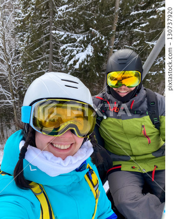 Skiers Taking Selfie on Snowy Mountain Skiers Taking Selfie on Snowy Mountain 130737920