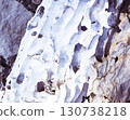 texture of drifted wood on the rocks, beautiful nature wallpaper 130738218