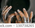 Hands of craftsman artist working on pottery wheel. 130738265
