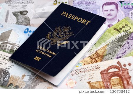American passport on Syrian money 130738412