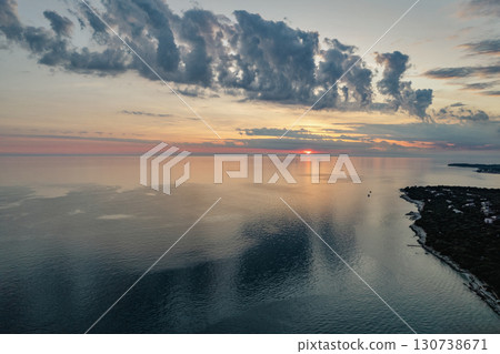 Sunset clouds over the Adriatic coast. Istria, Croatia. Sunset clouds over the Adriatic coast. Istria, Croatia. 130738671
