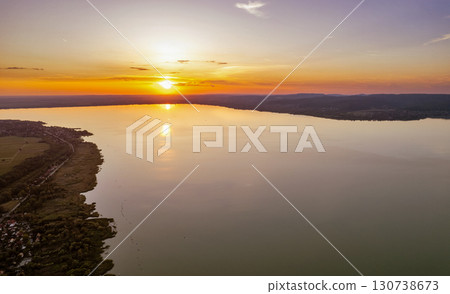 Spectacular sunset over lake Balaton with golden reflections, Hungary. 130738673